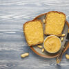 Peanut butter sandwiches or toasts with raspberry jam.